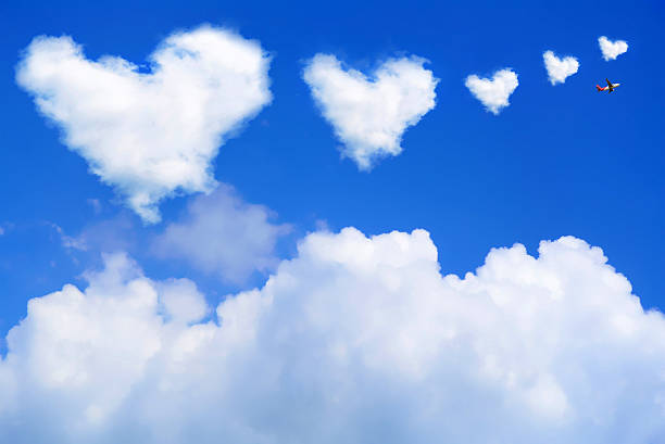 istock heart shaped cloud in the blue sky 463241603