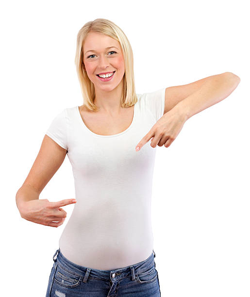 istock Young blond woman pointing to blank white shirt 463245073