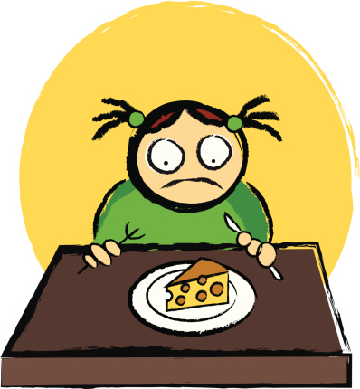 A girl who is unhappy with the cheese on her plate.