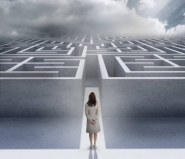 istock Woman looking at a maze 463258407