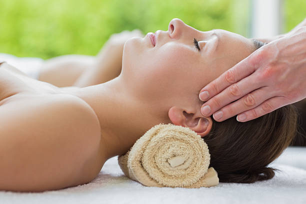 istock Woman having her head massaged 463261865
