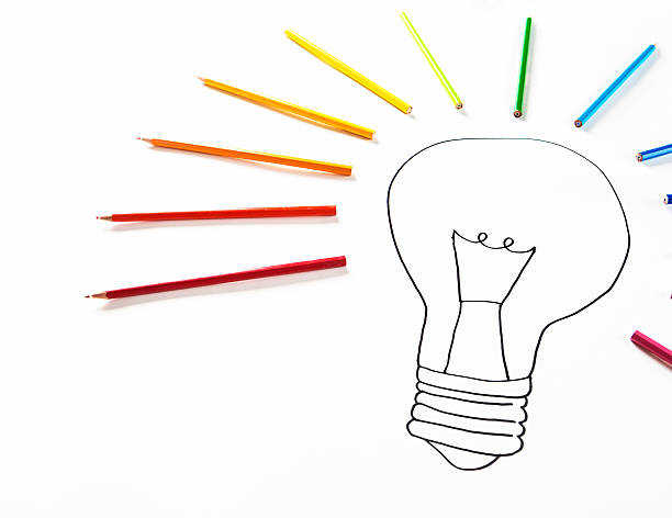 istock Cropped view of inspirational light bulb sketch ringed in crayons 463267533