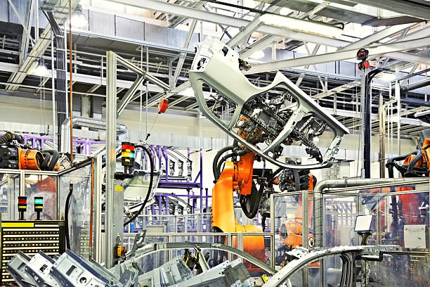 istock robots in a car factory 463270303