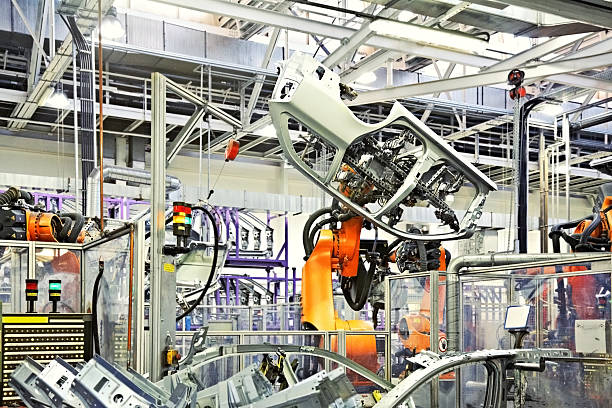 роботы в автомобильный завод - machine part hydraulic platform machine production line стоковые фото и изображения