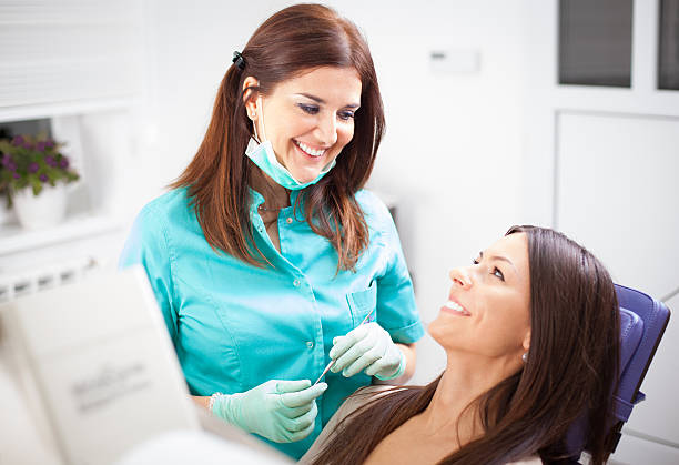 istock Young woman patient and dentist 463270837
