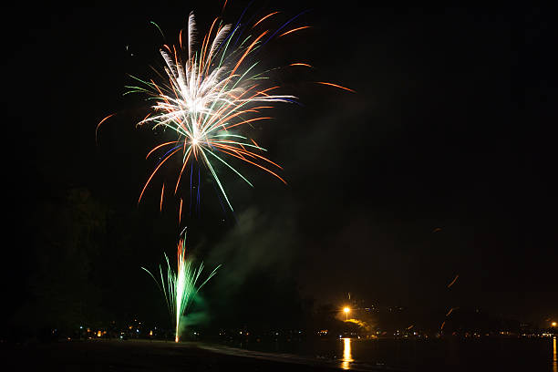 istock beautiful fireworks celebrating new year on the beach 463279007