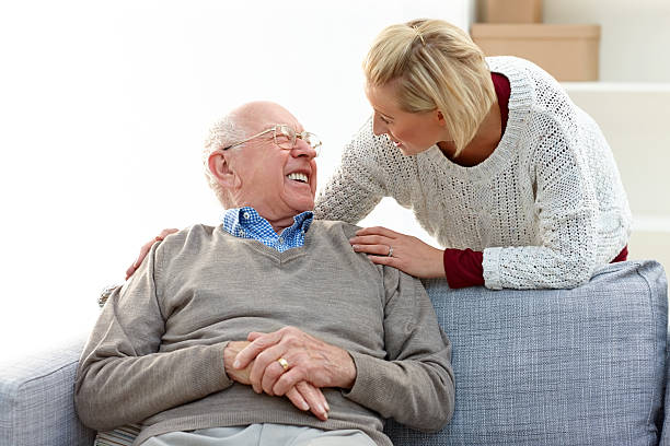 istock Elderly man in a happy conversation with his daughter 463307255