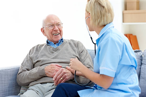 istock Female doctor making a house call 463315363