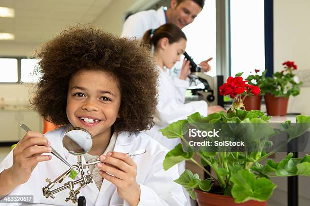 School Science Lab Stock Photo - Download Image Now - Child, Classroom, Lab Coat