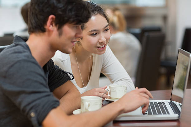 istock Two people drinking in college coffee shop 463320817