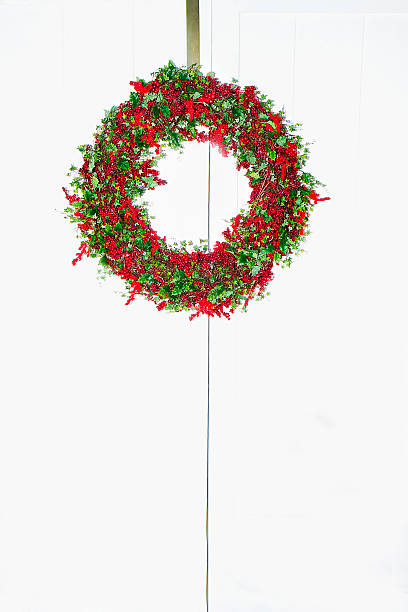 istock Cranberry Wreath on Double Doors 463328799