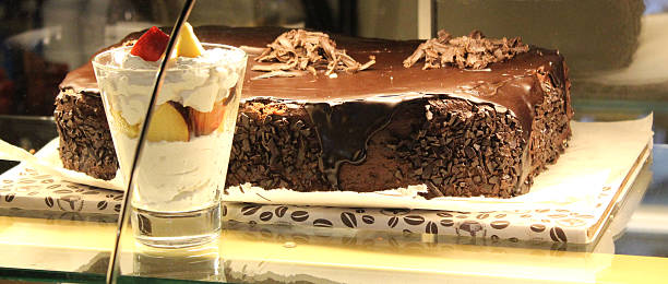 istock chocolate cake and ice-cream in the shopwindow 463329285