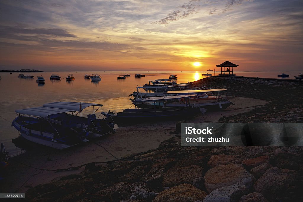 sunrise over fishing boats on Bali sunrise over fishing boats in Tanjung Benoa, Bali, Indonesia Tanjung Benoa Stock Photo