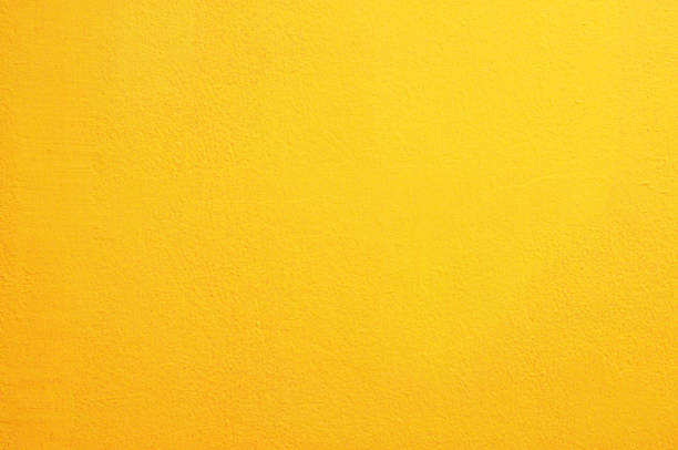 yellow concrete wall background - sarı stok fotoğraflar ve resimler