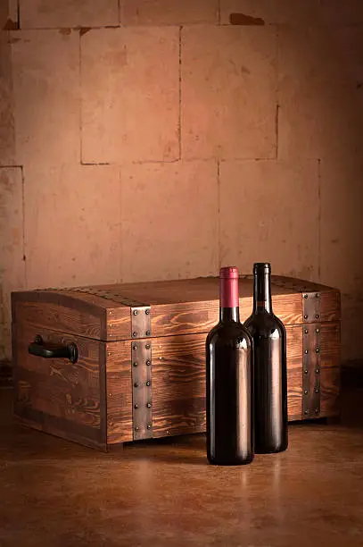 Wooden case with two bottles of red wine