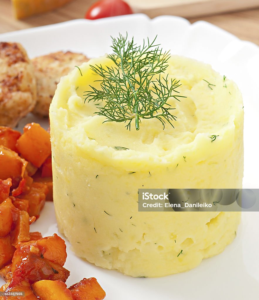 Fried cutlets, stewed pumpkin and mashed potatoes Barbecue - Meal Stock Photo