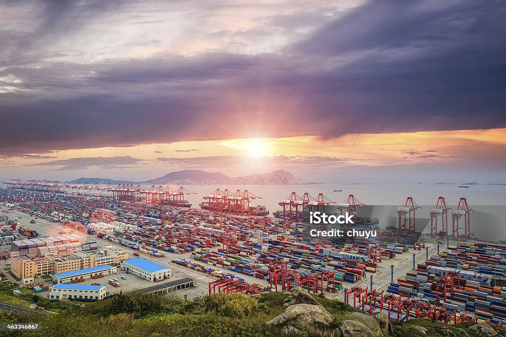 busiest container terminal at dusk panoramic view busiest container port in sunset Harbor Stock Photo