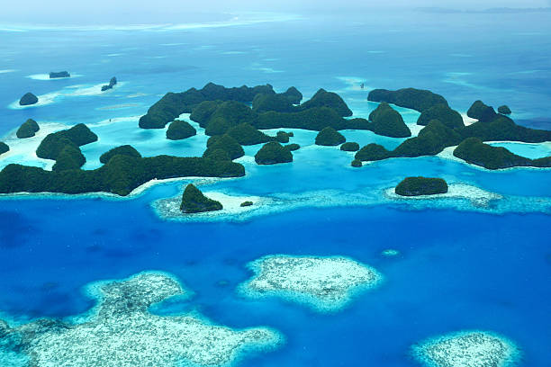 Seventy Islands in Palau Aerial view of Palau’s Seventy Islands. palau beach stock pictures, royalty-free photos & images