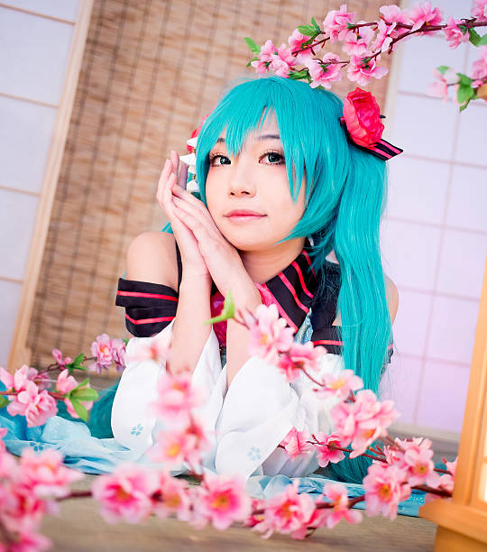 Asian cosplay girl Sakura Washitsu with turquoise hair Asian Cosplay Girl Sakura Washitsu cosplay event stock pictures, royalty-free photos & images