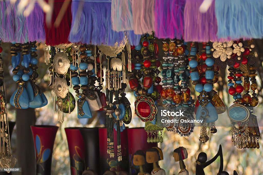 memorabilia Various souvenirs, colourful beads at Thai marketplace. Art Stock Photo