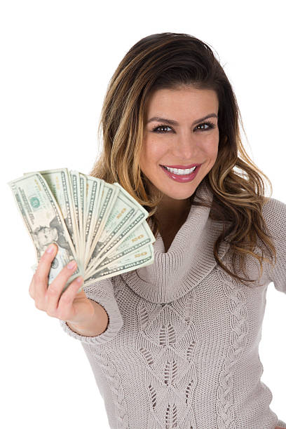 istock woman with cash 463351541
