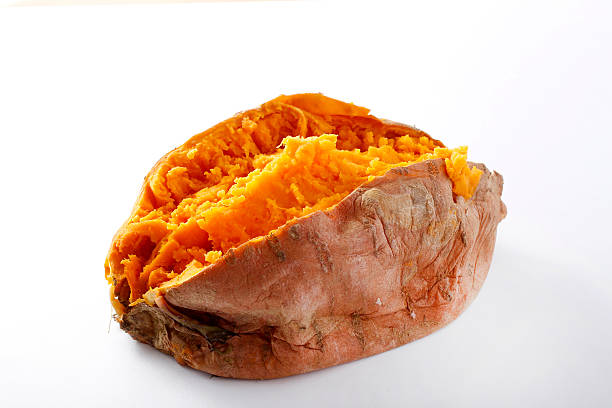 istock A baked sweet potato with a white background 463352191