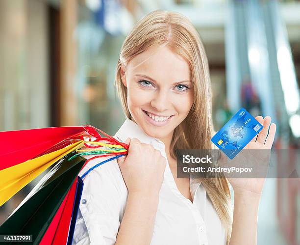 Woman With Bags And Credit Card Stock Photo - Download Image Now - One Woman Only, Retail, Shopping