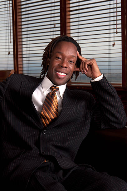 istock Young Professional Man in Suit Smiling 463369559