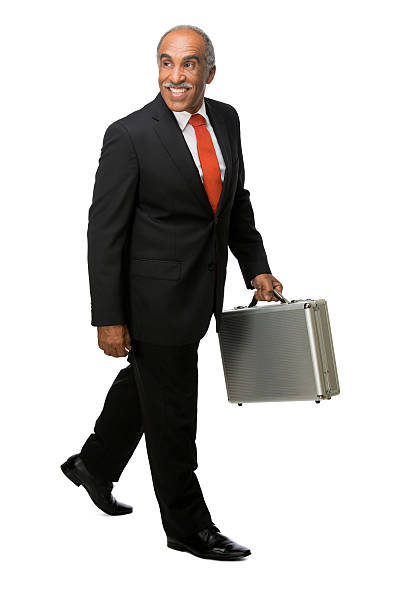 istock Happy latin business man carrying briefcase 463374095