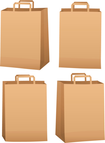 Four brown grocery bags with small handles