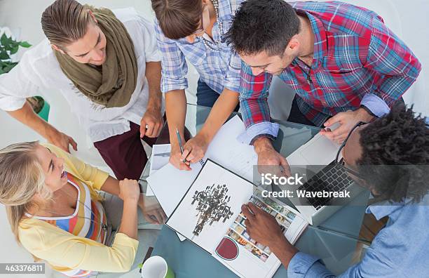 Overview Of Young Designers Working Together Stock Photo - Download Image Now - 20-29 Years, Adult, Beautiful People