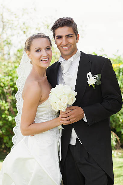 istock Joyful classy young newlyweds embracing 463377455
