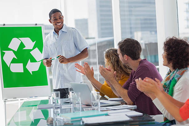 istock Team clapping their hands during meeting about eco policy 463378841