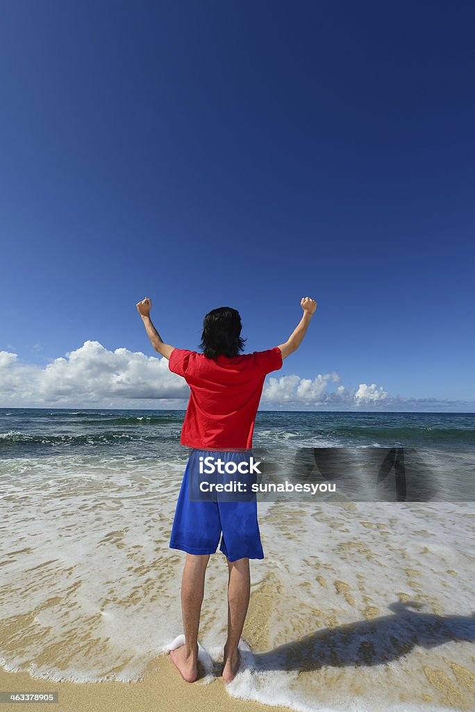 Man on the beach enjoy sunlight Active Lifestyle Stock Photo