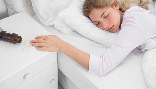 istock Pretty woman lying motionless after overdose 463382585