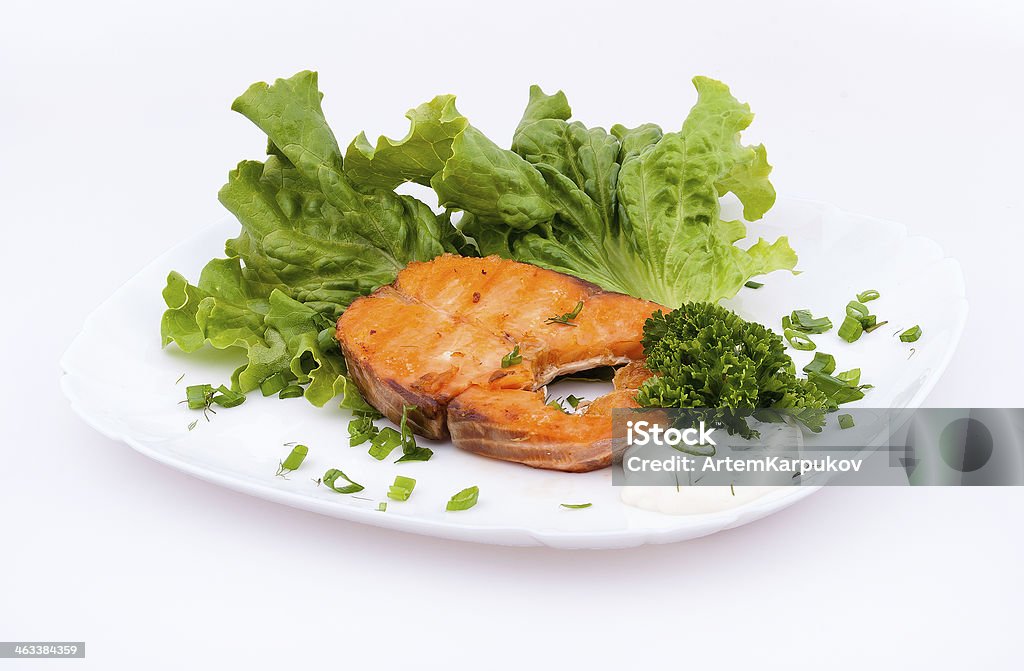 roast trout roast trout with green and lettuce Acid Stock Photo