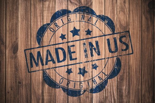Made in Us stamp printed on plank wood