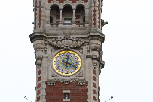 Clock tower of the Chamber of commerce (Belfry) in Lille, France.