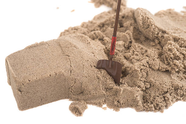 istock shovel on heap of sand macro 463401119