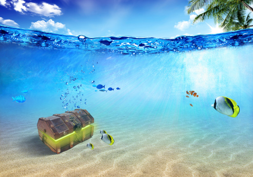 Underwater scene with treasure near tropical island