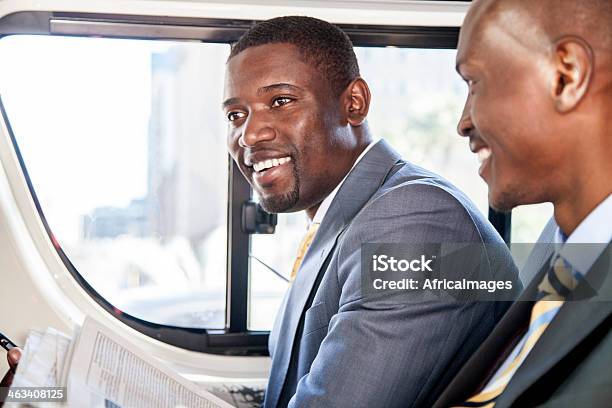 African Businessmen Talking In A Taxi Stock Photo - Download Image Now - 20-29 Years, 30-39 Years, Adult