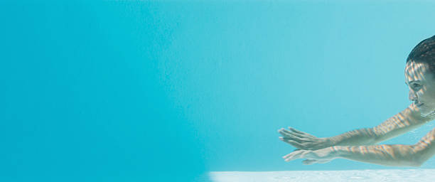 istock Woman in swimming pool 463409067