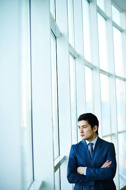 istock Pensive Asian businessman 463409495
