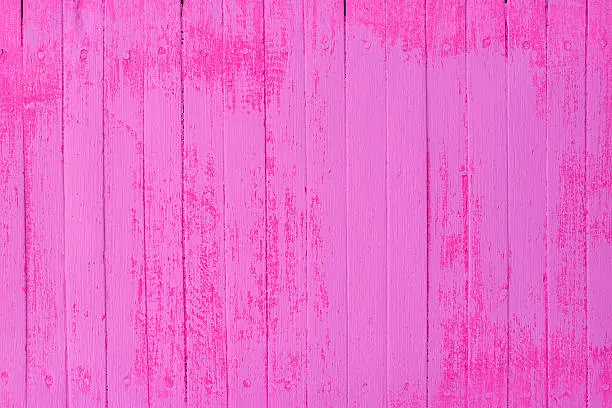 Old pink/rose coloured wood boards.