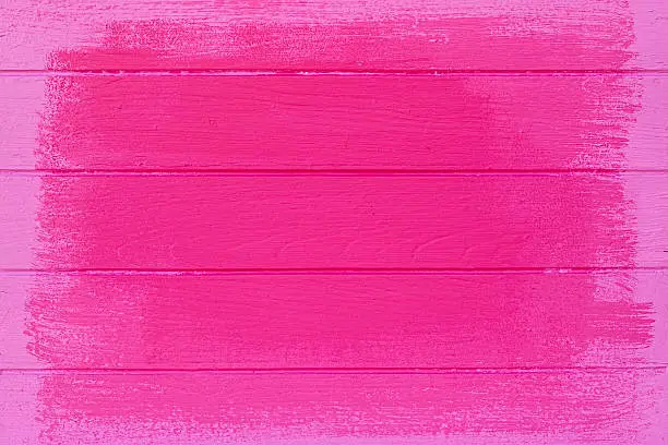 Old pink/rose coloured wood boards.