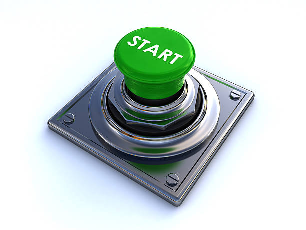 Green button labeled start in the middle stock photo
