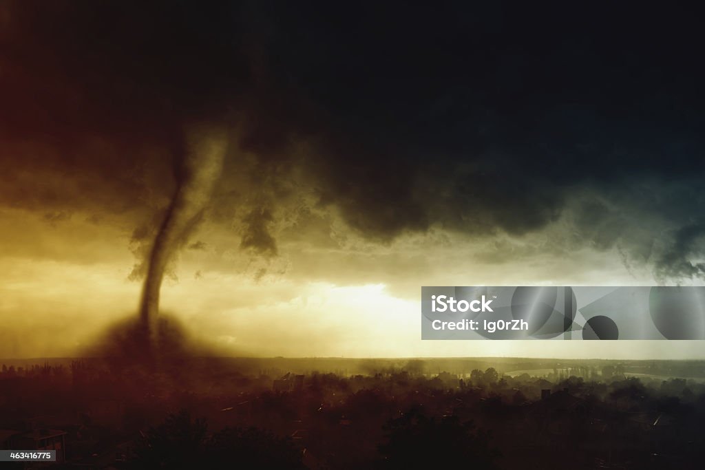 Tornado Nature force background - dark stormy sky, huge tornado hits small town Tornado Stock Photo
