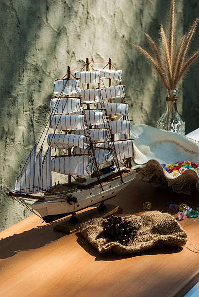 istock wooden sail ship toy model with shells 463417407