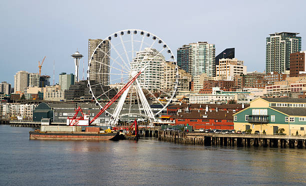 Waterfront Piers Dock Buildings Needle Ferris Wheel Seattle Infrastructure, Buildings, and waterfront attractions Elliott Bay Seattle seattle ferris wheel stock pictures, royalty-free photos & images