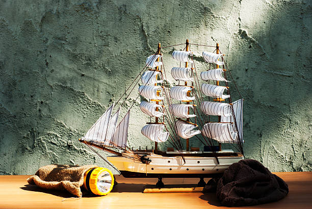 istock wooden sail ship toy model with torch 463424445